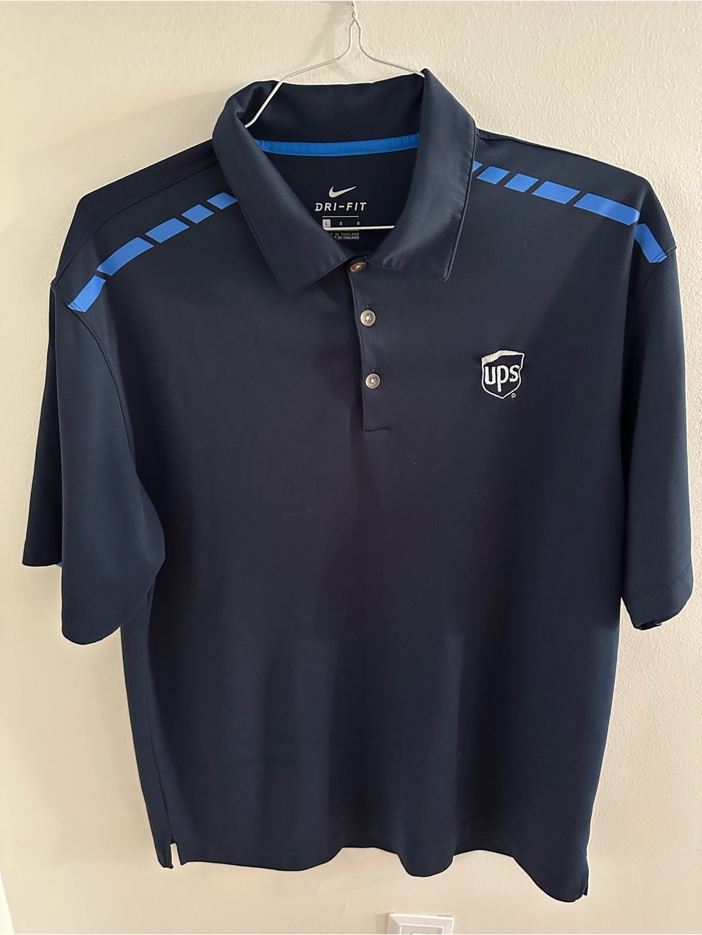 Nike Men's Navy Polo with Blue Shoulder Accents and UPS Logo